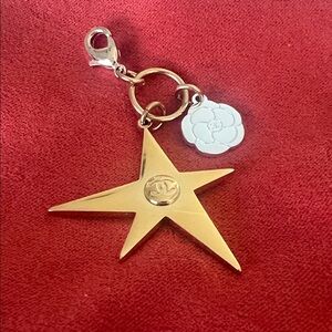 CHANEL Gold Star Charm Keyring with White Camellia Tag